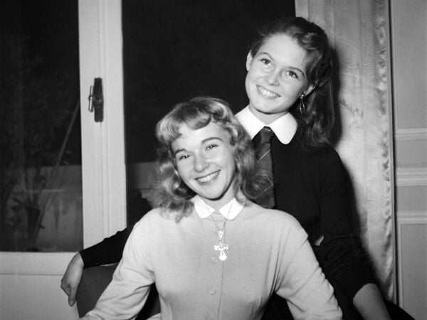 (FILES) French actress Brigitte Bardot, aged 18 years old, takes the pose with her younger sister Mijanou, in September 1952. French actress Brigitte Bardot died at 91 AFP learned from Bardot foundation on December 28, 2025. (Photo by AFP)