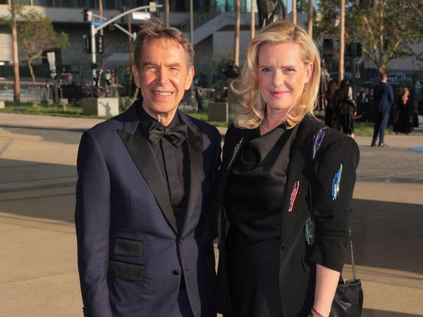 US artist Jeff Koons (L) and Justine Koons attend the Los Angeles County Museum of Art's (LACMA) opening gala for the David Geffen Galleries at LACMA in Los Angeles, on April 16, 2026. (Photo by Etienne LAURENT / AFP)