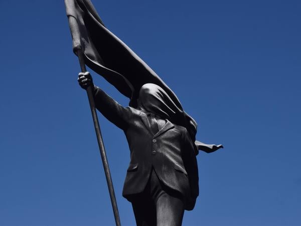 April 30, 2026, London, England, United Kingdom: A statue depicting a man holding a flag which covers his face, and signed Banksy at the base of the plinth, has appeared in Waterloo Place in Central London. The elusive street artist has now confirmed that the sculpture is his work. London United Kingdom PUBLICATIONxINxGERxSUIxAUTxONLY - ZUMAv130 20260430_zip_v130_067 Copyright: xVukxValcicx