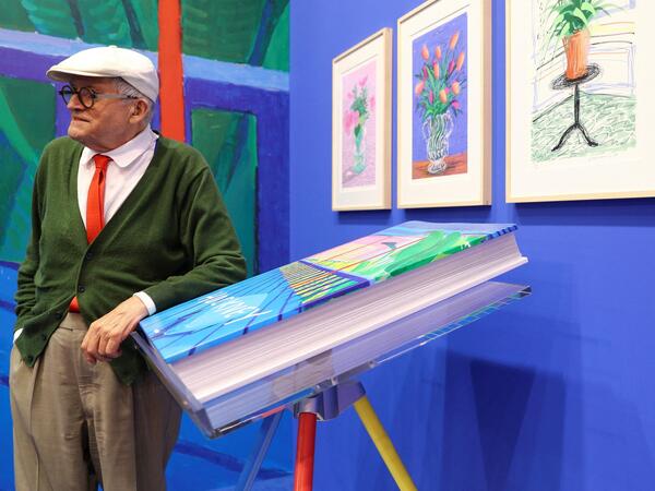 FILE PHOTO: David Hockney poses with Taschen's "A Bigger Book" prior to the opening of the book fair in Frankfurt, Germany October 18, 2016. REUTERS/Kai Pfaffenbach/File Photo