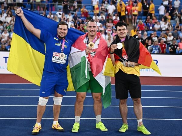 Athletics - European Athletics Championships - Alexander Stadium, Birmingham, Britain - August 11, 2026
Gold medallist Hungary's Bence Halasz poses after winning the men's hammer throw final with silver medallist Germany's Merlin Hummel and bronze medallist Ukraine's Mykhaylo Kokhan REUTERS/Dylan Martinez