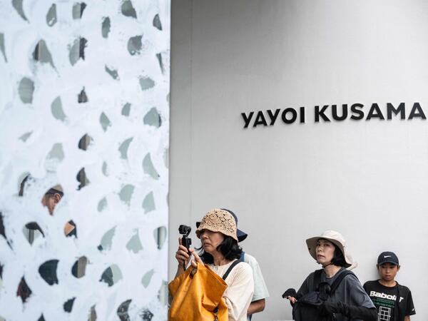 Visitors line up outside the Yayoi Kusama Museum in Tokyo on August 27, 2026. Japan's Yayoi Kusama, one of the world's most celebrated contemporary artists, has died aged 97, her company said on August 27, triggering tributes from around the world. (Photo by Andrew CABALLERO-REYNOLDS / AFP)